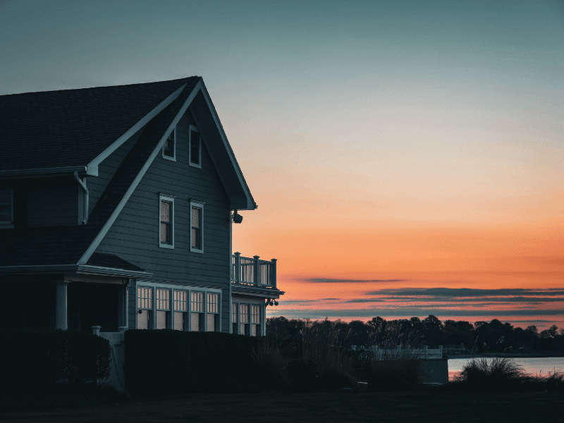 Vacation home at sunset, representing long-term financial goals